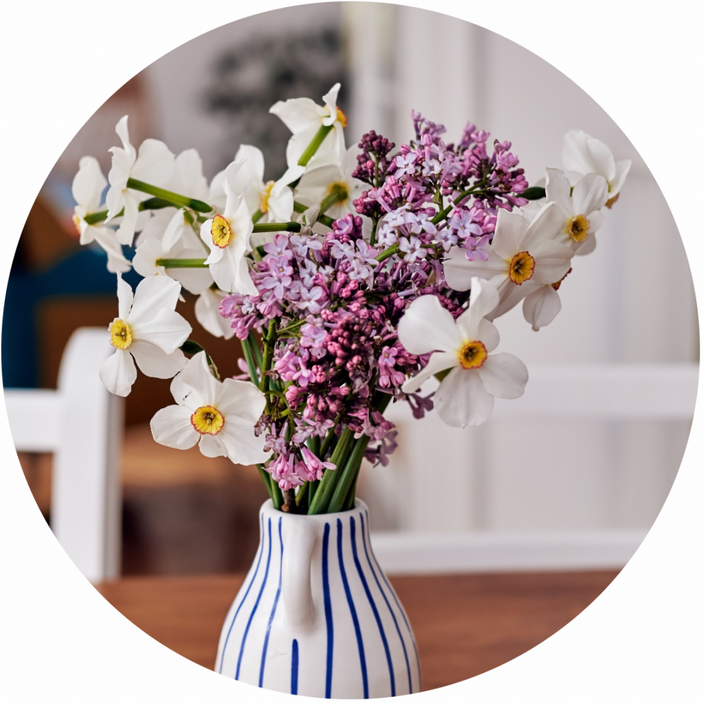 Fresh flowers in blue and white vase