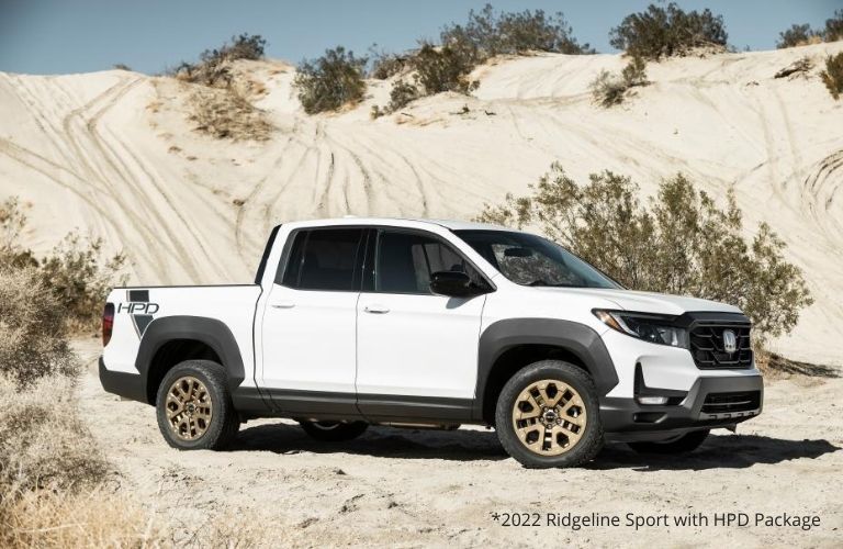 Side angle view of the 2022 Ridgeline on a desert