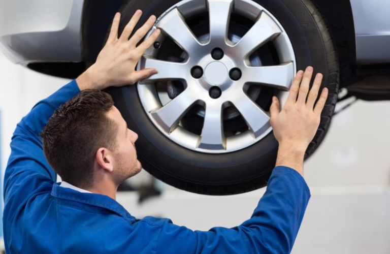 An image of the Adjustment of the Wheel Tire of the vehicle at the service center.
