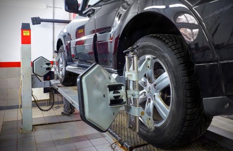 An image of the Wheel Alignment Maintenance Service of the vehicle at the service center.